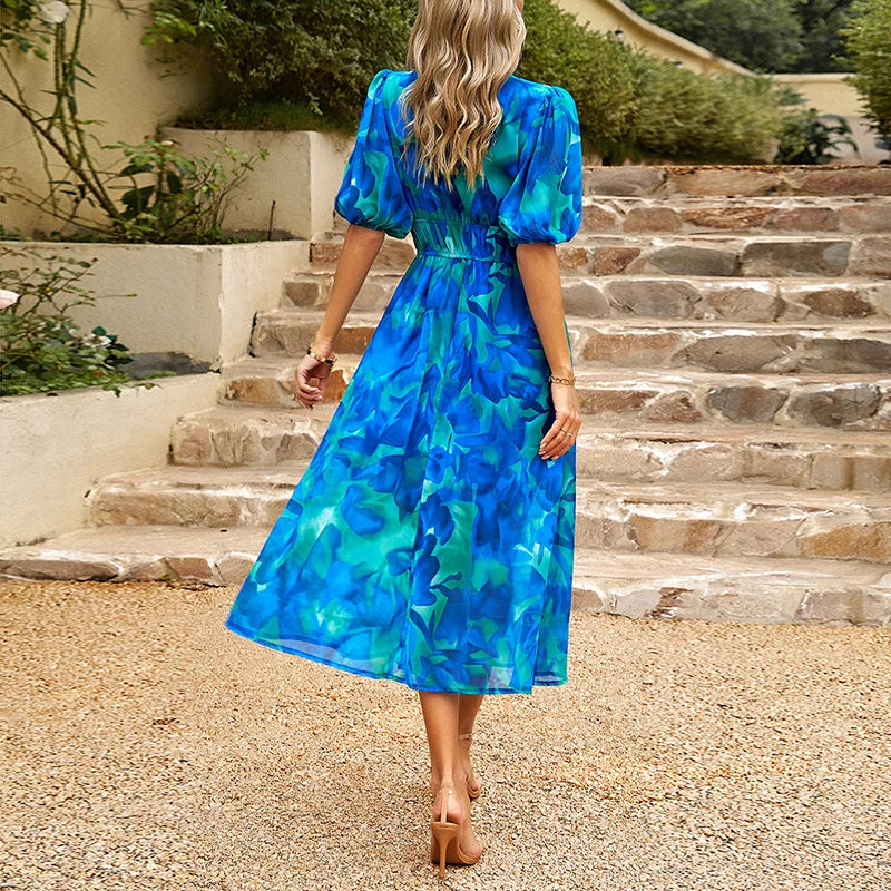 Sophie | Blumengemustertes Midikleid mit Smock und Eleganz