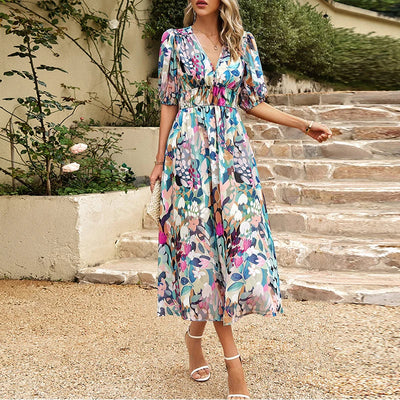 Sophie | Blumengemustertes Midikleid mit Smock und Eleganz