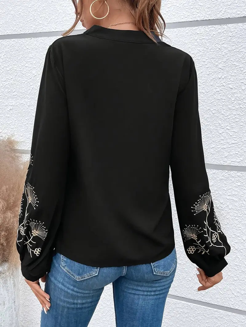 Elegante Langarmbluse mit Stickerei und V-Ausschnitt – Schwarz